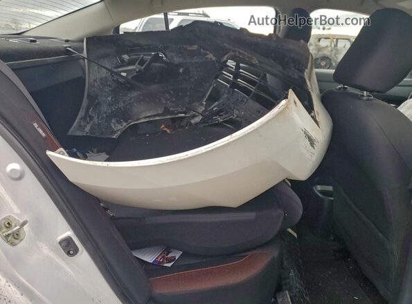 3N1CN8FV4ML852203 2021 NISSAN VERSA White Rear seats view