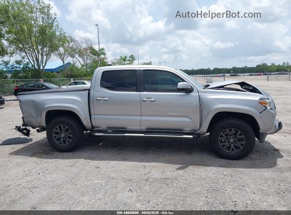 3TMAZ5CN7LM133077 2020 TOYOTA TACOMA Silver Սալոնի հետևի տեսք