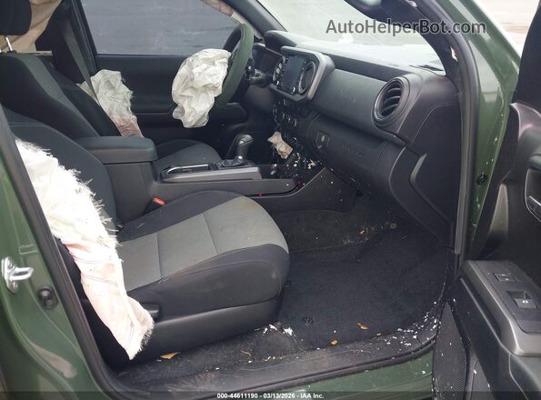 3TMAZ5CN8MM157258 2021 TOYOTA TACOMA Green Front interior view