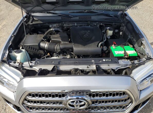3TMCZ5AN2HM057965 2017 TOYOTA TACOMA Silver Vista interior trasera