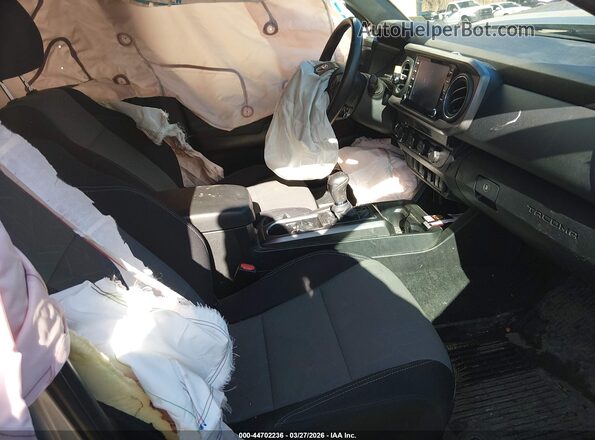 3TMCZ5ANXPM593075 2023 TOYOTA TACOMA Silver Widok wnętrza z przodu