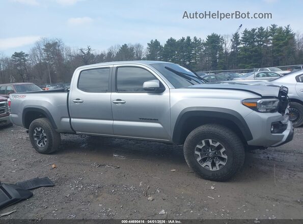 3TYDZ5BN6PT036445 2023 TOYOTA TACOMA Silver უკანა სალონის ხედი