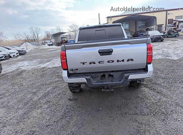 3TYLE5JN0RT008832 2024 TOYOTA TACOMA Silver Rear view