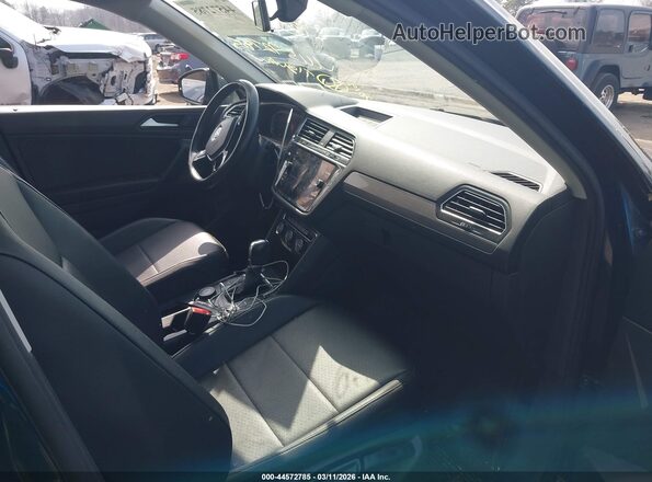 3VV2B7AX0KM092915 2019 VOLKSWAGEN TIGUAN Green Front interior view