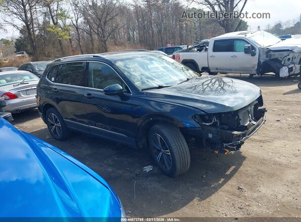 3VV2B7AX0KM092915 2019 VOLKSWAGEN TIGUAN Green Rear interior view
