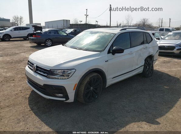 3VV2B7AX7MM069585 2021 VOLKSWAGEN TIGUAN White Front left