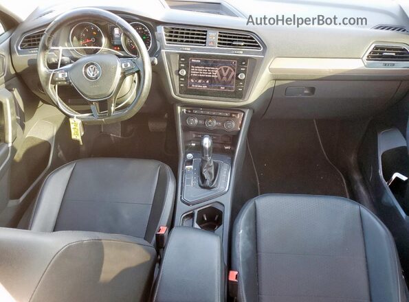 3VV3B7AX4JM106589 2018 VOLKSWAGEN TIGUAN Black წინა პანელის ხედი