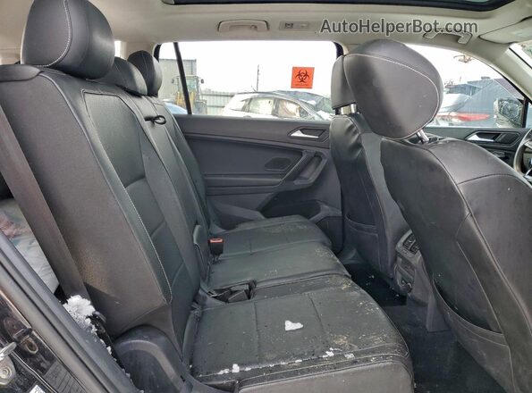 3VV3B7AX5MM105259 2021 VOLKSWAGEN TIGUAN Black Widok wnętrza z tyłu
