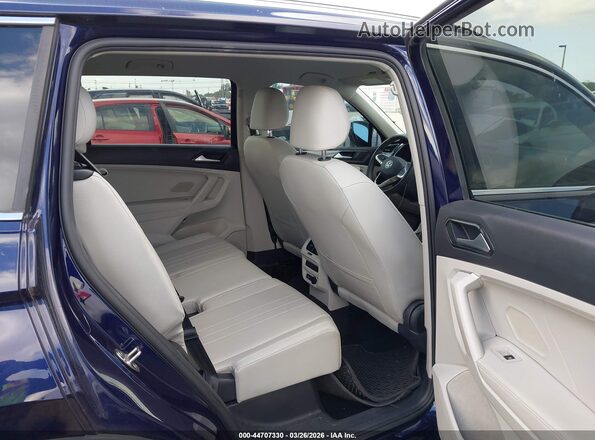 3VV3B7AX5PM056875 2023 VOLKSWAGEN TIGUAN Blue VIN sticker view