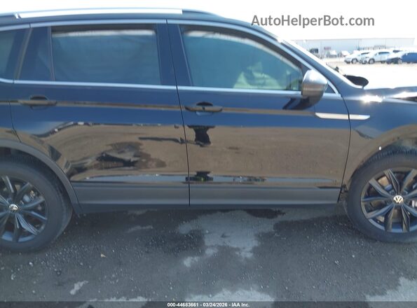 3VV3B7AX6RM185047 2024 VOLKSWAGEN TIGUAN Black Rear interior view