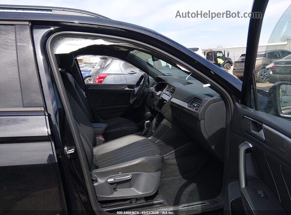 3VVCB7AX9PM115491 2023 VOLKSWAGEN TIGUAN Black Вид салону спереду
