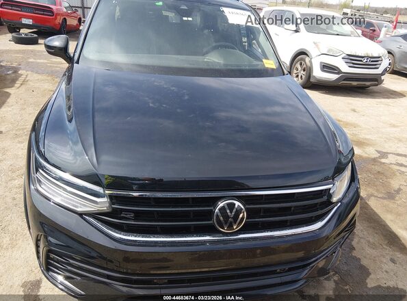 3VVCB7AX9PM115491 2023 VOLKSWAGEN TIGUAN Black Вид задньої частини салону