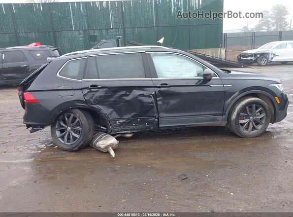 3VVMB7AX2PM008352 2023 VOLKSWAGEN TIGUAN Black Սալոնի հետևի տեսք
