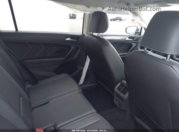 3VVMB7AX2PM068258 2023 VOLKSWAGEN TIGUAN White Вид наклейки з VIN-кодом