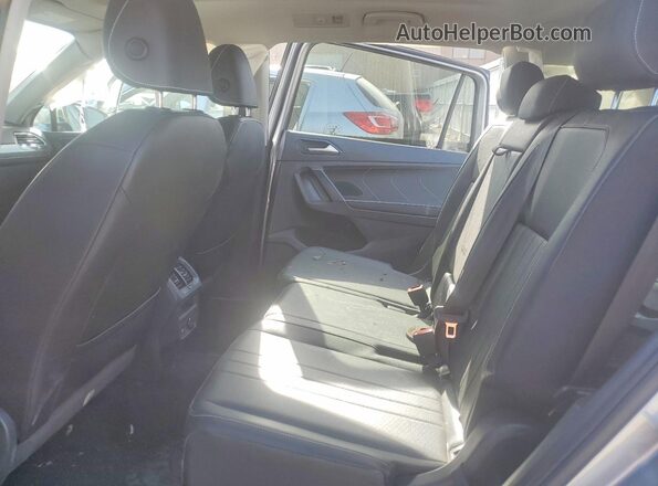 3VVNB7AX1PM035997 2023 VOLKSWAGEN TIGUAN Серый Вид задней части салона