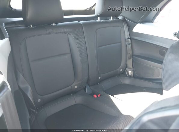 3VW5DAAT8JM503232 2018 VOLKSWAGEN BEETLE White Vista de la etiqueta del VIN