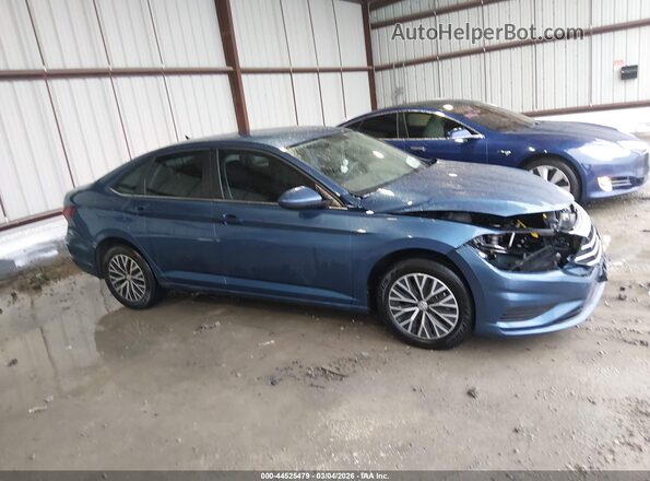 3VWC57BU7MM087015 2021 VOLKSWAGEN JETTA Blue Widok wnętrza z tyłu