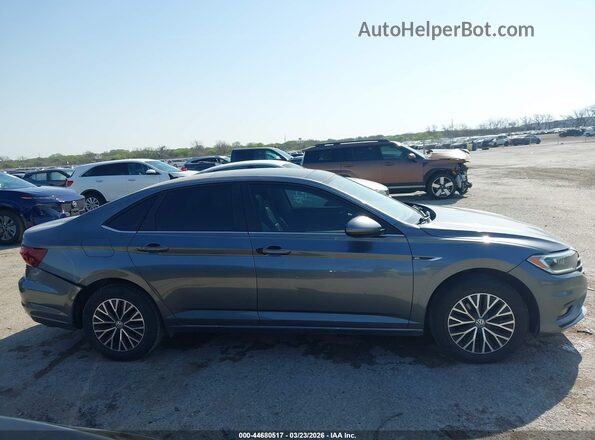 3VWEB7BU1KM233293 2019 VOLKSWAGEN JETTA Серый Вид задней части салона