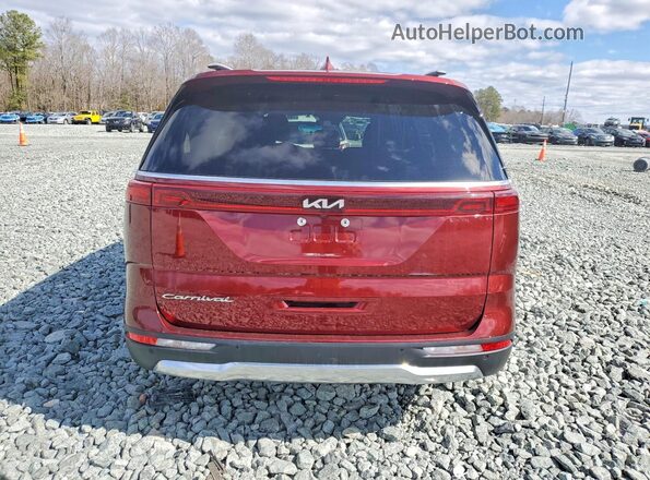 KNDNE5H38N6082034 2022 KIA CARNIVAL Red Вид салону спереду