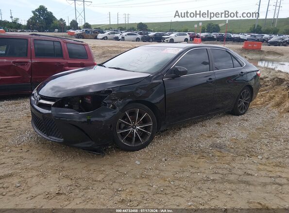 4T1BF1FK3GU201721 2016 TOYOTA CAMRY Black Vista tres cuartos delantera izquierda