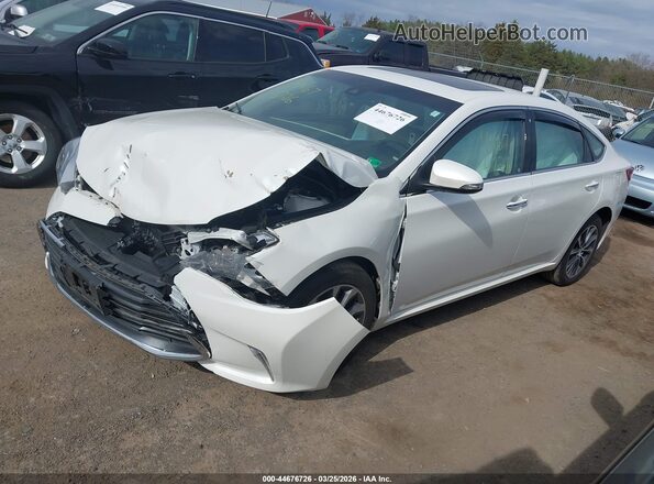 4T1BK1EB7JU275096 2018 TOYOTA LE White Vista tres cuartos delantera izquierda