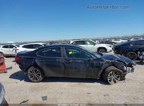 4T1DAACK6TU667911 2026 TOYOTA LE Черный Вид задней части салона