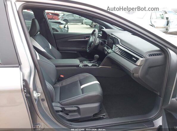 4T1DAACK9SU516320 2025 TOYOTA CAMRY Серый Вид салона спереди