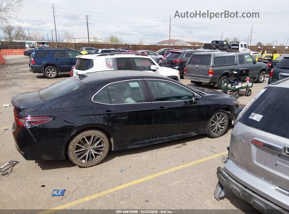 4T1G11BK7PU101082 2023 TOYOTA CAMRY Black Widok wnętrza z tyłu