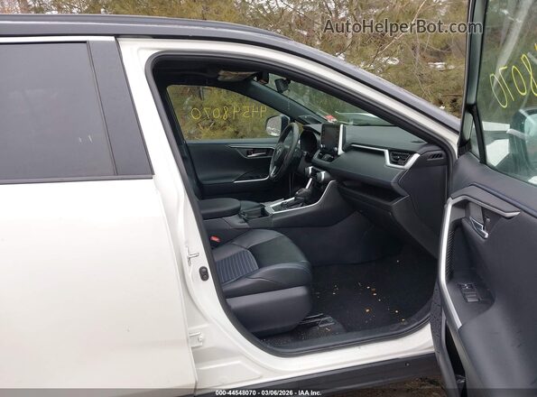 4T3E6RFV1MU021386 2021 TOYOTA RAV4 HYBRID White Front interior view
