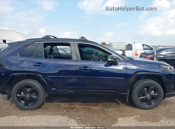 4T3E6RFV5LU002757 2020 TOYOTA RAV4 HYBRID Blue Widok wnętrza z tyłu