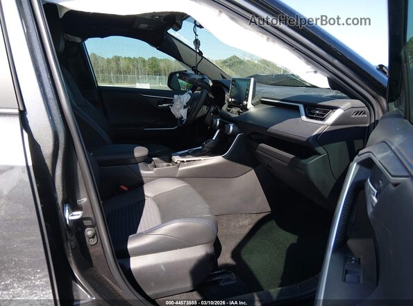 4T3E6RFVXMU063409 2021 TOYOTA RAV4 HYBRID Gray Widok wnętrza z przodu