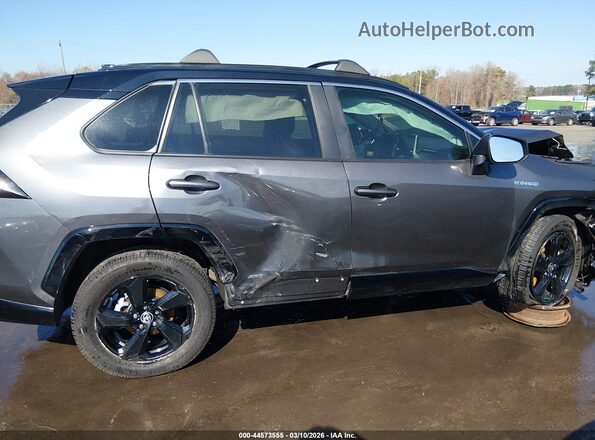 4T3E6RFVXMU063409 2021 TOYOTA RAV4 HYBRID Gray Widok wnętrza z tyłu