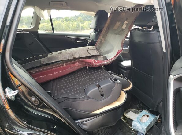4T3RWRFV9RU147195 2024 TOYOTA RAV4 Black Widok wnętrza z tyłu
