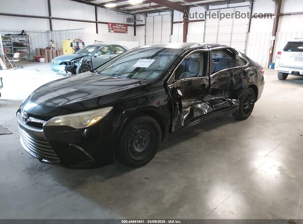 4T4BF1FK7GR538799 2016 TOYOTA LE Black Vista tres cuartos delantera izquierda