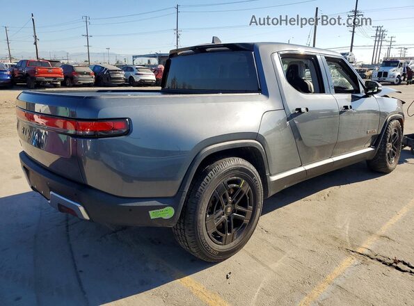 7FCTGAAA4PN001004 2023 RIVIAN R1T Gray Delantero derecho