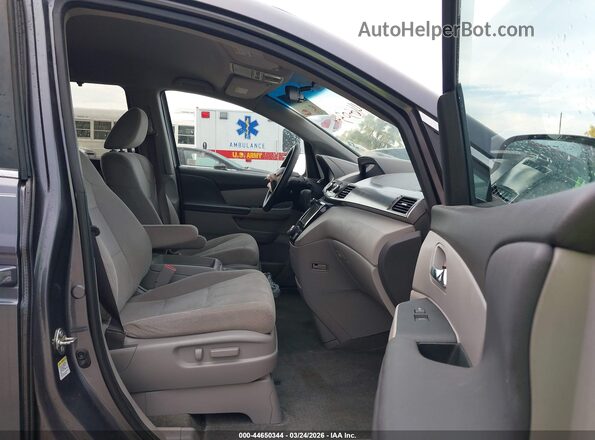 5FNRL5H46GB105379 2016 HONDA ODYSSEY Gray Front interior view