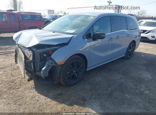 5FNRL6H78PB068769 2023 HONDA ODYSSEY Light Blue Առջևի ձախ երեք քառորդ տեսարան