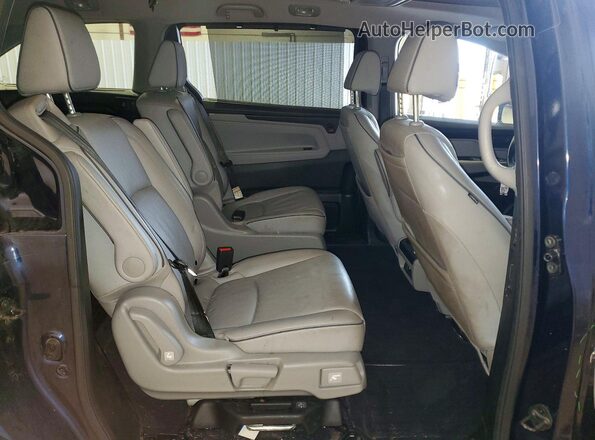 5FNRL6H90PB064510 2023 HONDA ODYSSEY Blue Rear interior view