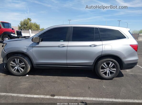 5FNYF5H38JB009240 2018 HONDA PILOT Silver Vista interior trasera
