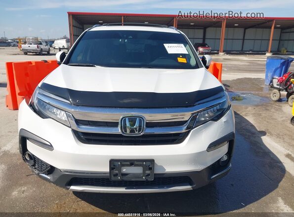 5FNYF6H08MB034509 2021 HONDA PILOT White Widok wnętrza z tyłu