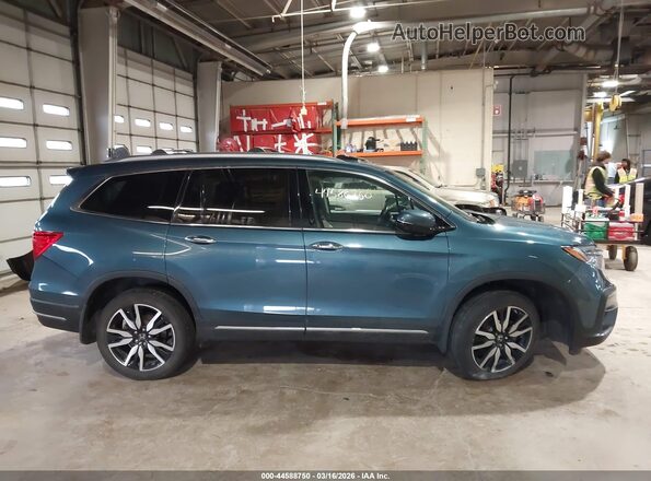 5FNYF6H09MB072668 2021 HONDA PILOT Blue Rear interior view
