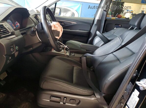 5FNYF6H20MB057140 2021 HONDA PILOT Black Front interior view
