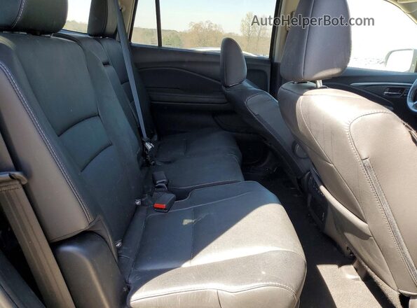 5FNYF6H24MB068125 2021 HONDA PILOT Black Rear interior view