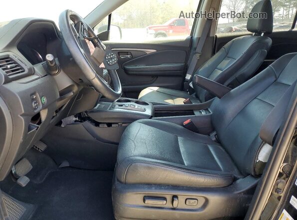 5FNYF6H24MB068125 2021 HONDA PILOT Black Front interior view