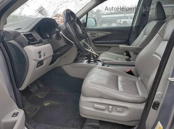 5FNYF6H52KB009436 2019 HONDA PILOT Серебряный Вид салона спереди