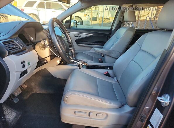 5FNYF6H59MB093533 2021 HONDA PILOT Charcoal Front interior view