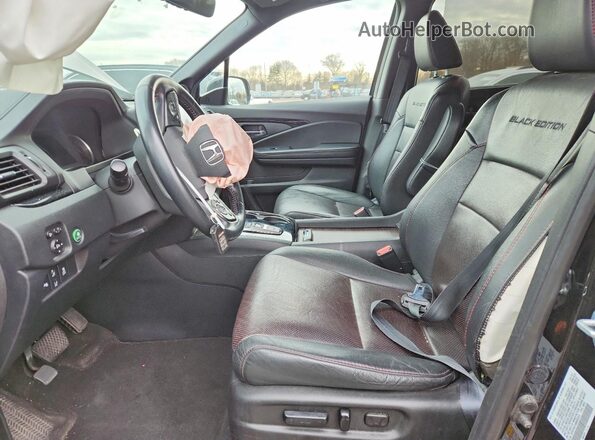 5FNYF6H74MB052972 2021 HONDA PILOT Black Front interior view