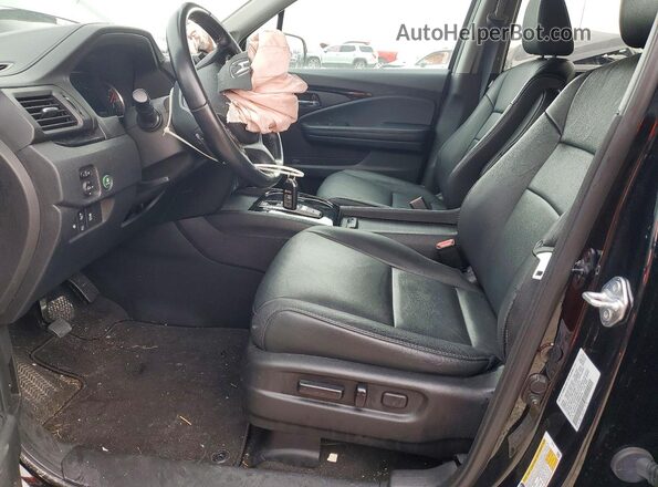 5FNYF6H97MB062638 2021 HONDA PILOT Black Front interior view