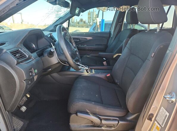 5FNYF7H24MB009016 2021 HONDA PASSPORT Silver Front interior view