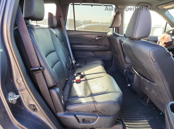 5FNYF8H07KB015717 2019 HONDA PASSPORT Charcoal Rear interior view